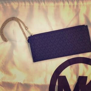 Michael Kors Wristlet logo